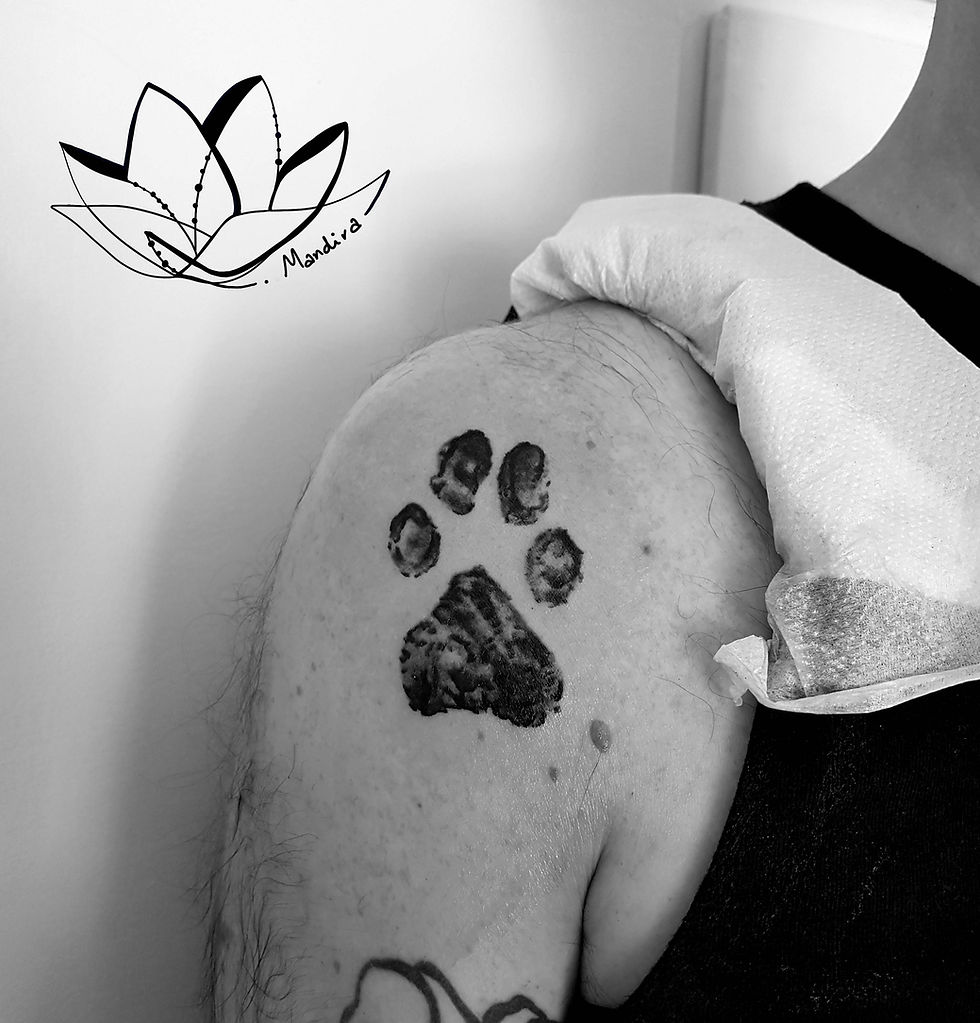 Dog paw custom tattoo by Mandira