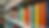 Eye-level view of colorful children's books arranged on a low shelf