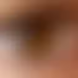 a close up image of human eyes