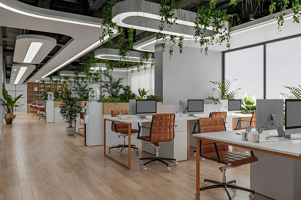 Modern open-plan office with white desks, brown leather chairs, desktop computers, wooden flooring, and abundant greenery including hanging plants and potted plants, with large windows allowing natural light to enter.