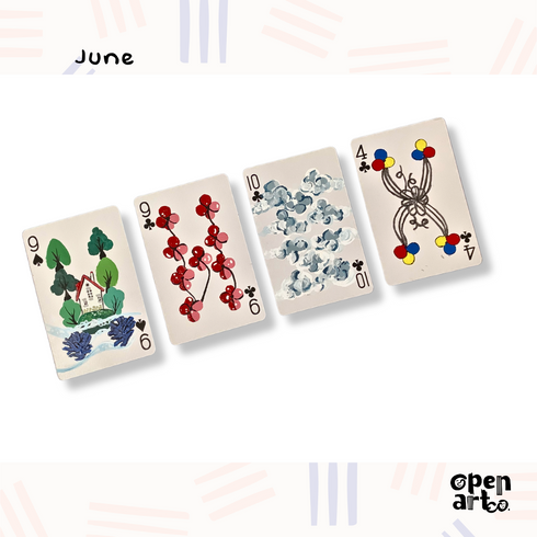 Four deck of card in diagonal with painted artwork on it