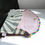 Thumbnail: Open clutch showing pink cotton lining and magnetic closure