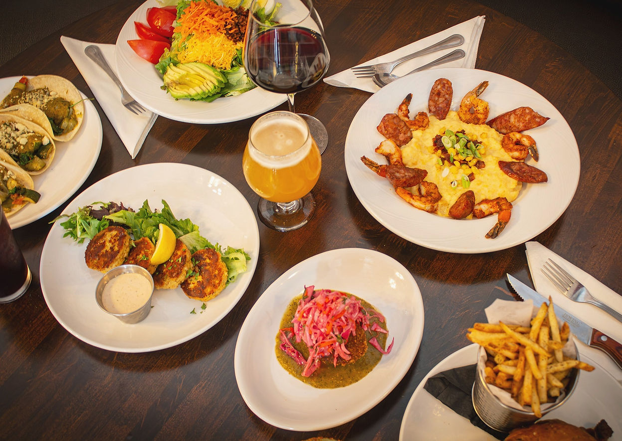 crab cakes crab stuffed avocado shrimp and grits and draft beer