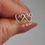 Thumbnail: Dainty sterling silver wire heart studs
