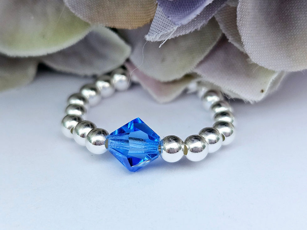 Thumbnail: Sterling silver and birth crystal elasticated rings