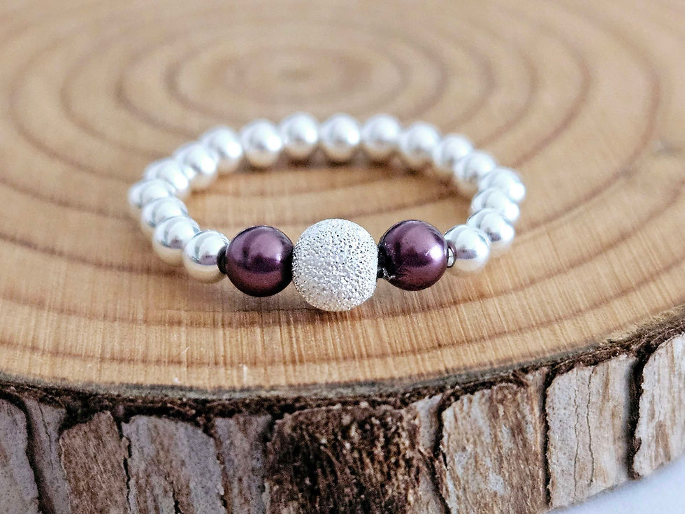 Thumbnail: Sterling silver elasticated rings with stardust bead and preciosa pearl beads