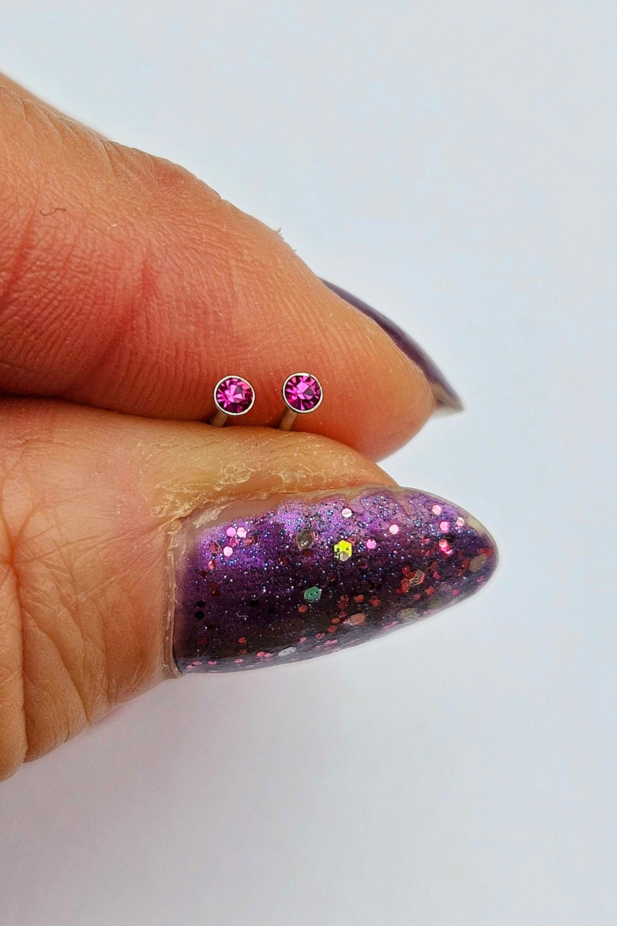 Sterling silver and fuchsia crystal micro stud earrings