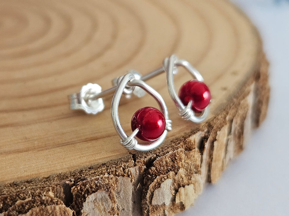 Thumbnail: Dainty sterling silver circle studs with red pearl bead