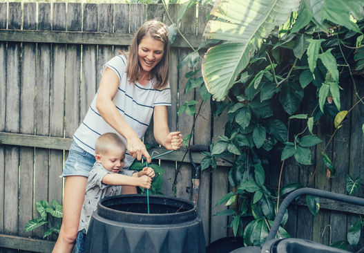 mother-and-son-mixing-compost-2021-10-24-11-57-12-utc_edited.jpg