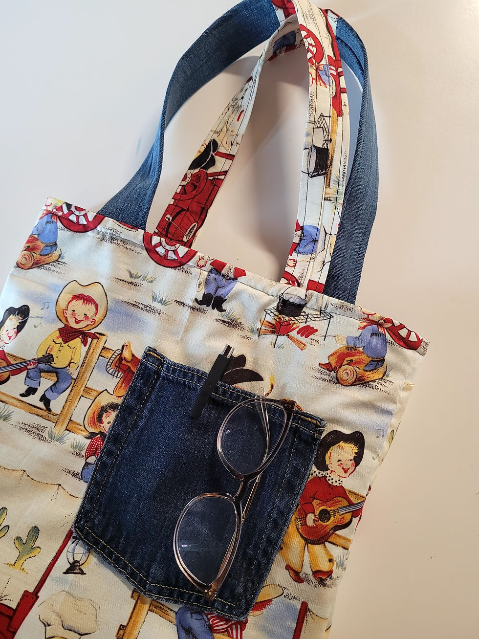 Thumbnail: Cowboy & Denim Reversible Book Bag