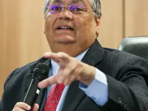 Dino e aliados atacam Estadão por revelar ‘Dama do Tráfico’