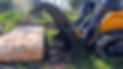 Compact loader using grapple for property cleanup.