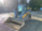 John Deere skid steer for gravel driveway installation