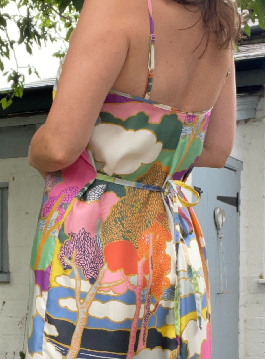 Back of dress showing waist ties, straps and bias binding