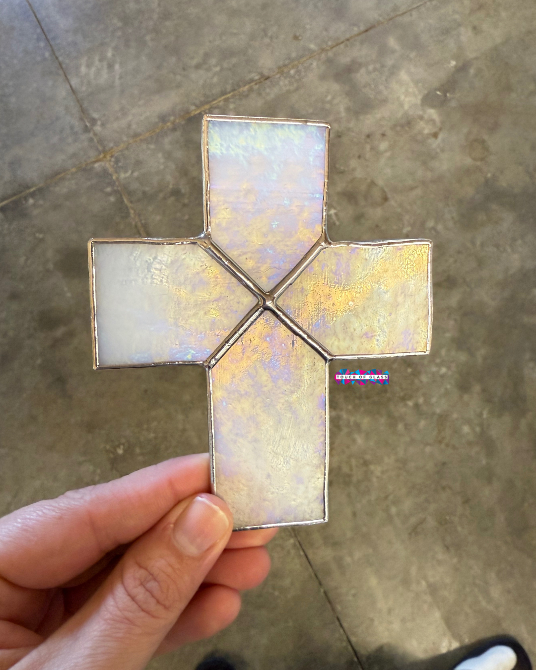 Iridescent white cross