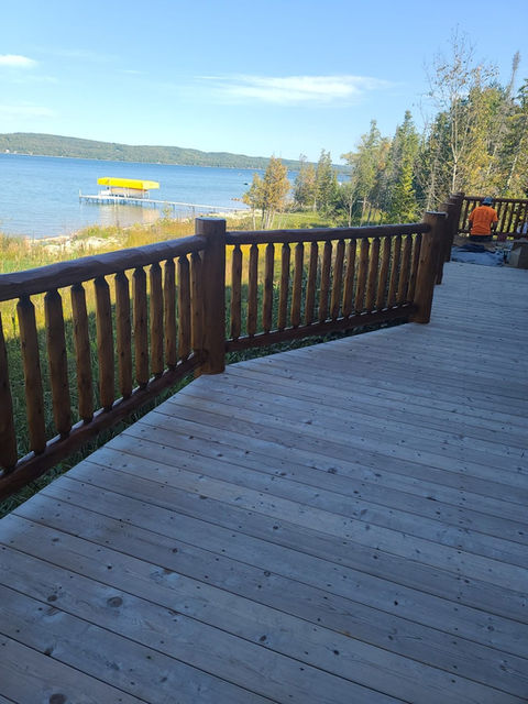 Expert Finishes - Painting, Staining, Power Washing, Chinking, Restoration and Maintenance - Charlevoix, Michigan.