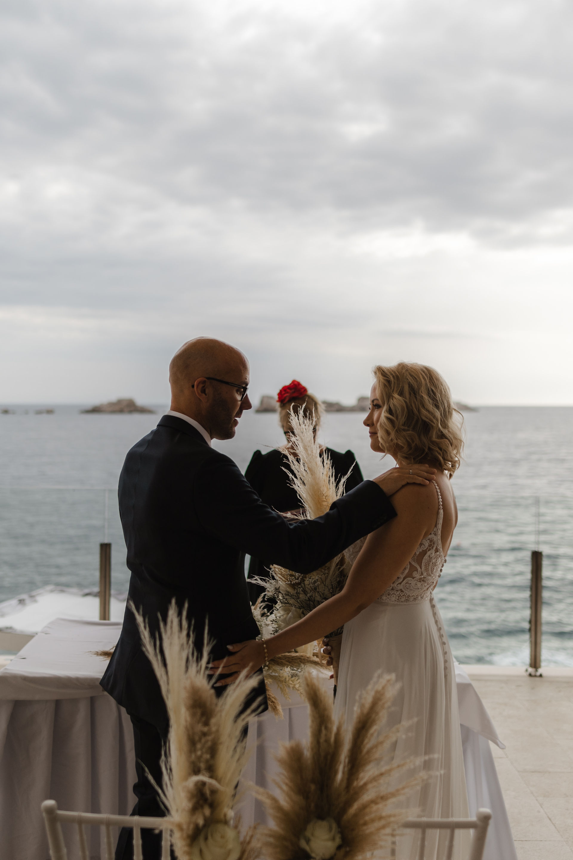 the groom says his vows to the bride