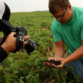 Farmer Jesse Hall shows soils fixed by including small grains in the rotation