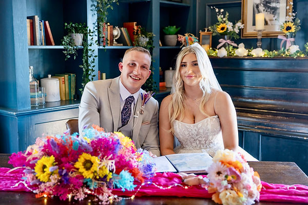 Wedding couple looking at the camera