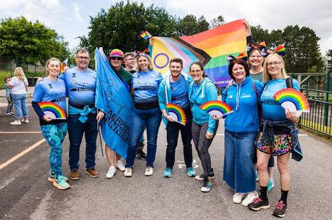 Eyes2Me Photography: Community & Public Event Photography. Pride parade in Caerphilly. A group of attendees is having some fun.