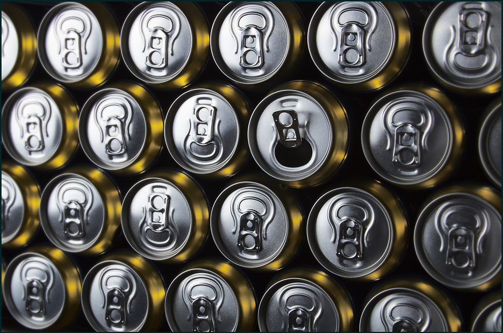 A close-up, eye-level view of rows of aluminium cans stacked on top of each other. One of the cans is open.