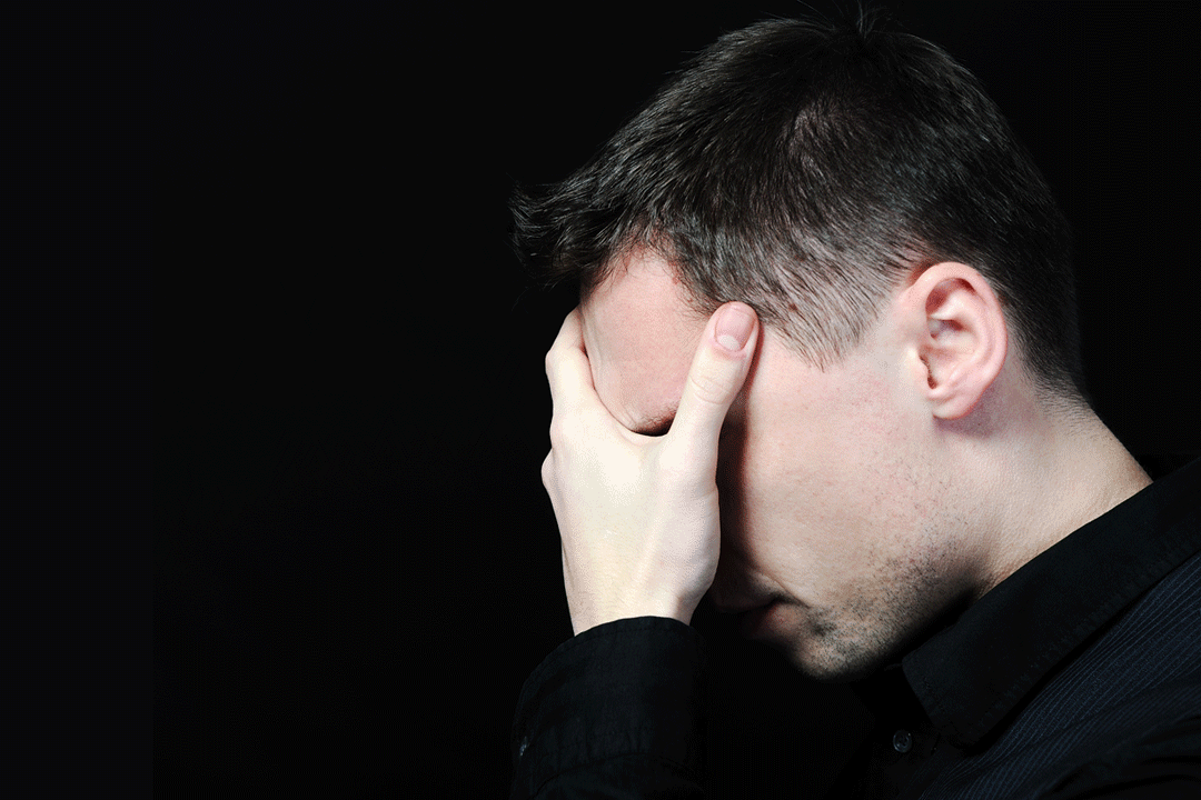 Sad Male Hiding Face
