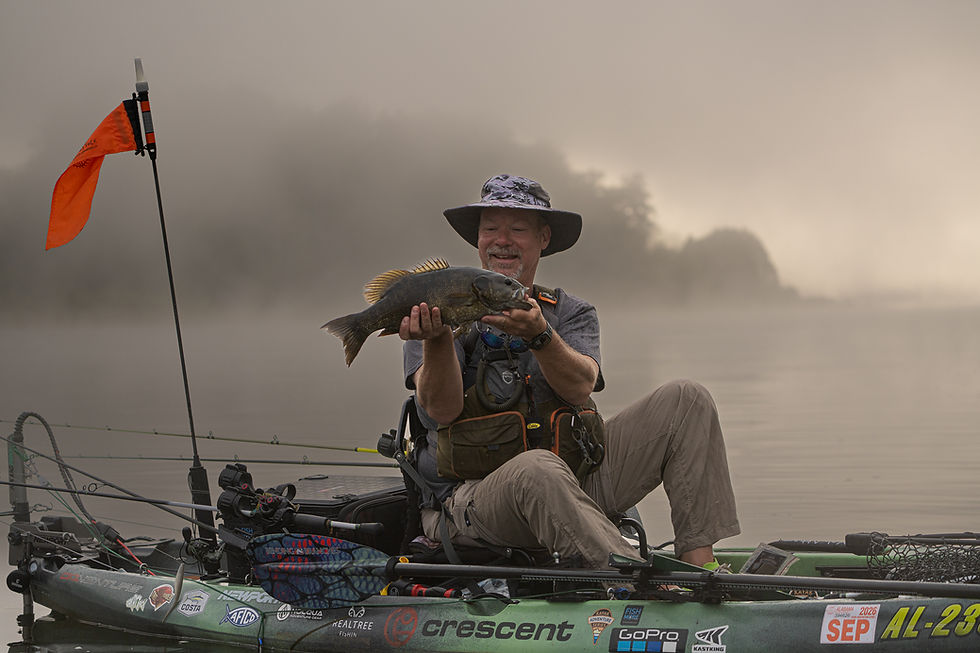 Don Schrader with a new personal best 20" smallmouth at Broodstock III, on the Allegheny River.