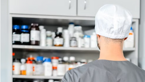 A pharmacist looking at the medicines