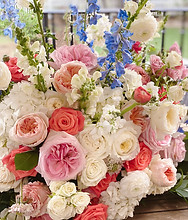 A pink and white floral arrangement from a wedding ceremony I coordinated.