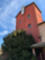 coral colored winery building