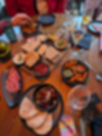 a spread of tapas, dips and snacks