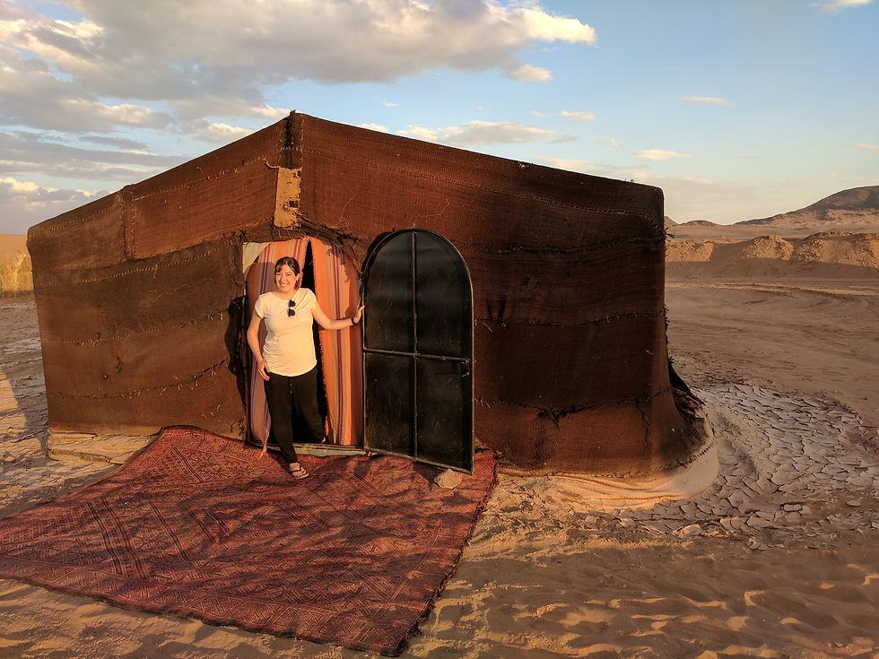 desert camp tent with metal frame and carpet