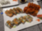 plate of three sushi rolls