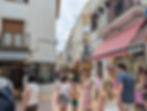pedestrian street with an ice cream shop