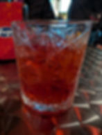 crystal glass of negroni