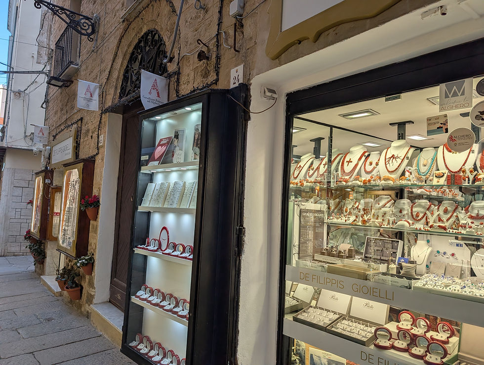 coral shops with a big letter A above the door