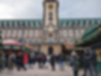famous Hamburg landmark with a Christmas market in front