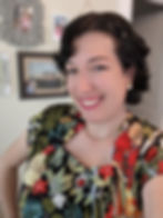 woman wearing black dress with frida kahlo on it