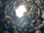View looking up on a nuraghe whose top fell in