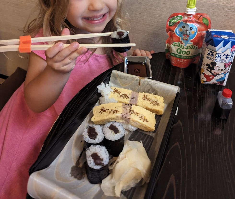 Girl eating sushi