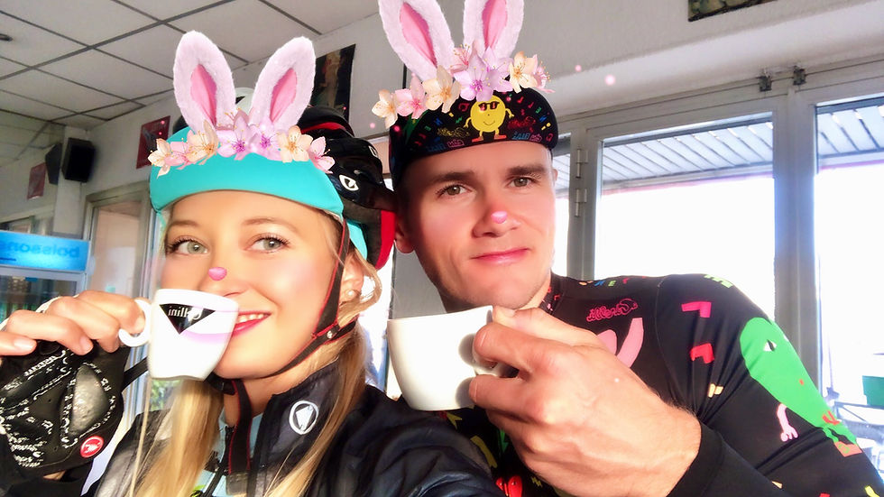 Cycling couple drinking coffee