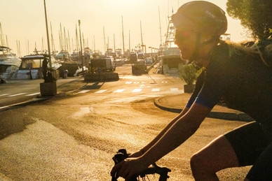 Cyclist catching first rays of the sun