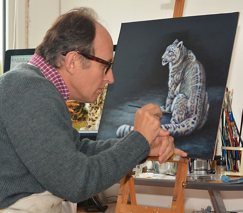 Artist Karl snow leopard painting on leather