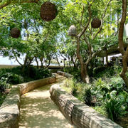 Garden apthway into Al fresco restaurant in Los Angeles