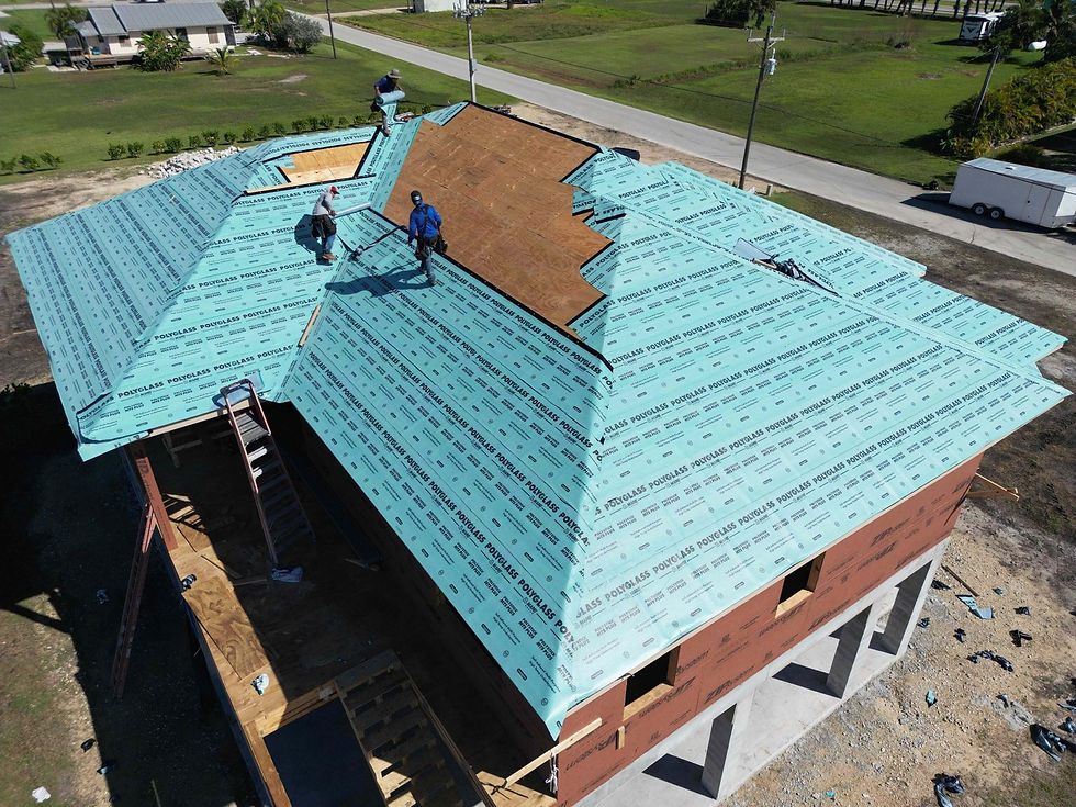 New construction standing seam metal roof dry in underlayment in Everglades City, FL — Craft Roofing | When Should a Roofing Contractor Become Involved in New Construction?