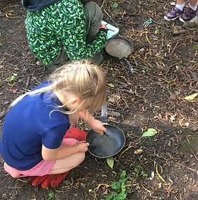 children making sparks with flint and steel 