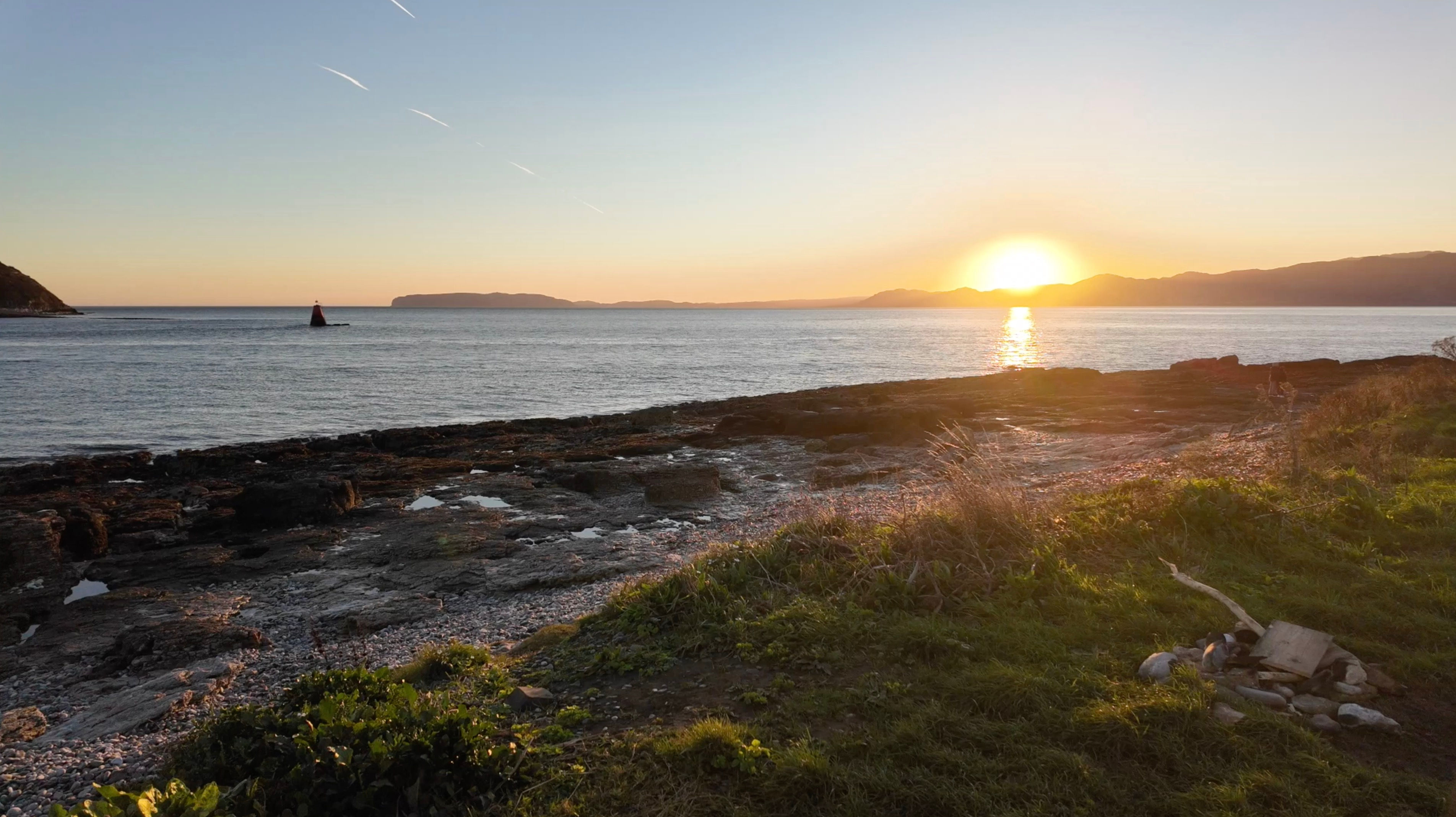 Sunrise over Hilltop & Calm Ocean