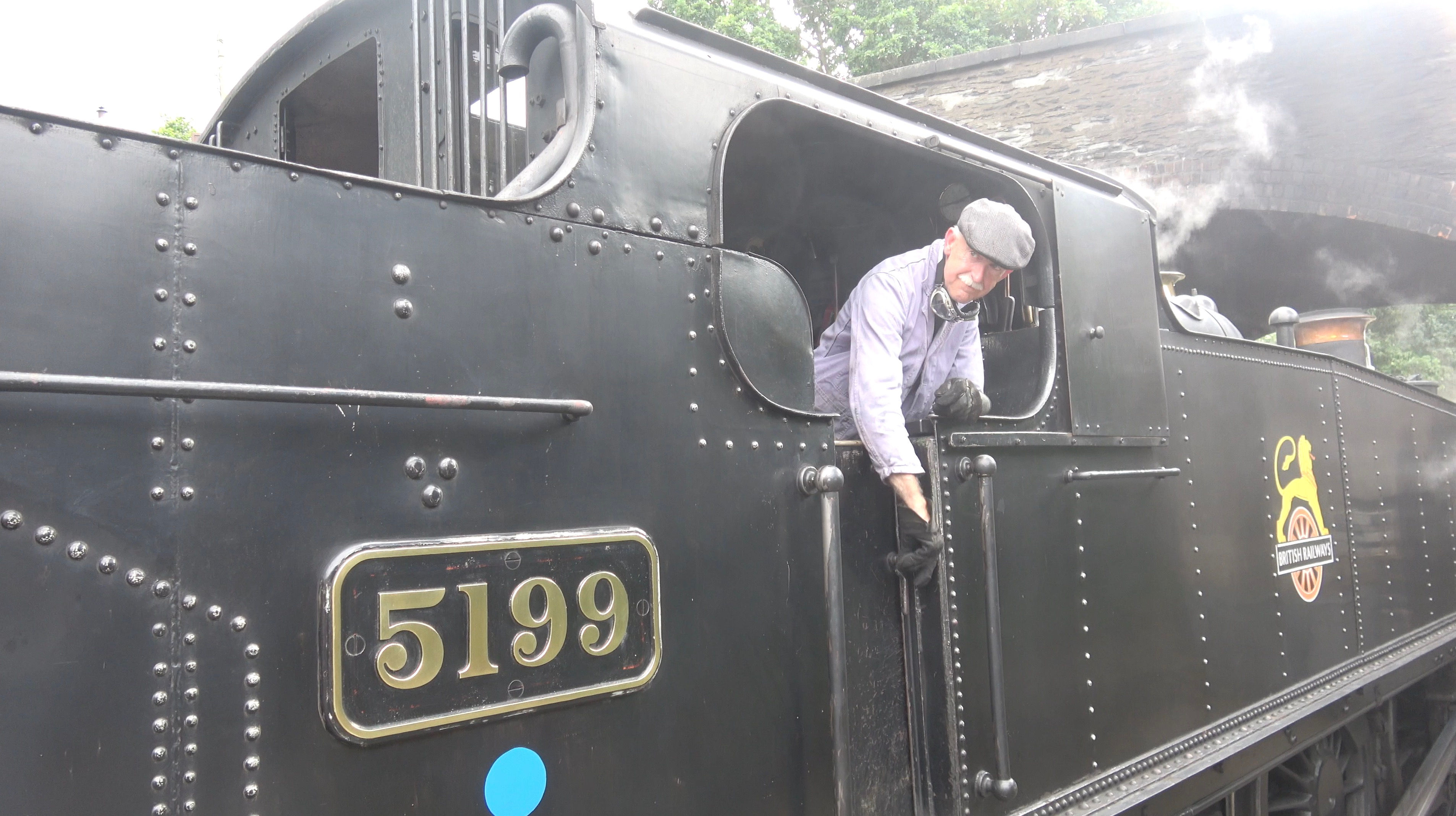Steam Train Departing Station