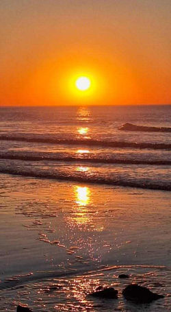 Zonsondergang in zee