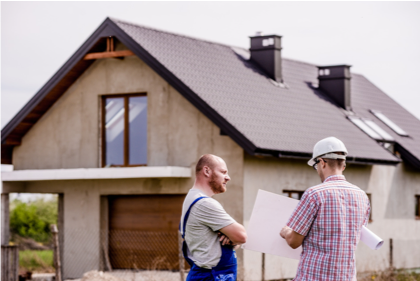 construction contractor speaking with another man